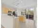 Well-equipped kitchen with an island and sliding glass doors at 3117 Bayshore Oaks Dr, Tampa, FL 33611