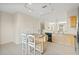 Bright kitchen boasting an island and stylish track lighting at 3117 Bayshore Oaks Dr, Tampa, FL 33611