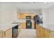Well-equipped kitchen featuring ample cabinetry and counter space at 3117 Bayshore Oaks Dr, Tampa, FL 33611