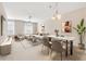 Open living and dining area with neutral decor and modern furniture at 3117 Bayshore Oaks Dr, Tampa, FL 33611