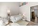 Cozy bedroom with twin bed, lamp, and fluffy chair at 3621 Darston St, Palm Harbor, FL 34685