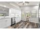 Bright kitchen boasts stainless steel appliances and white cabinetry at 3621 Darston St, Palm Harbor, FL 34685