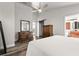 Main bedroom with a king-size bed and access to the bathroom at 3621 Darston St, Palm Harbor, FL 34685