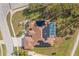 House with solar panels and a pool, top-down view at 3702 Gaviota Dr, Ruskin, FL 33573