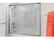 Shower/tub combo with sliding glass doors at 3702 Gaviota Dr, Ruskin, FL 33573