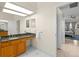 Bathroom with granite vanity and view of bedroom at 3702 Gaviota Dr, Ruskin, FL 33573