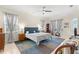 Bright and airy main bedroom with king-size bed and ample natural light at 3702 Gaviota Dr, Ruskin, FL 33573