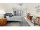 Spacious main bedroom with king-size bed and access to backyard at 3702 Gaviota Dr, Ruskin, FL 33573
