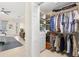 Walk-in closet with shelves and hanging space at 3702 Gaviota Dr, Ruskin, FL 33573