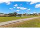 Scenic view of a peaceful golf course and tranquil pond at 3702 Gaviota Dr, Ruskin, FL 33573