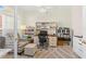 Bright home office with built in shelving and comfortable seating at 3702 Gaviota Dr, Ruskin, FL 33573