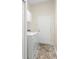 Laundry room with washer, dryer, and access to the outside at 3702 Gaviota Dr, Ruskin, FL 33573