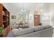 Cozy living room featuring a comfortable sofa and armchairs at 3702 Gaviota Dr, Ruskin, FL 33573