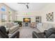 Spacious living room featuring ample seating and large windows at 3702 Gaviota Dr, Ruskin, FL 33573