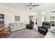 Bright living room with comfortable seating and a view to kitchen at 3702 Gaviota Dr, Ruskin, FL 33573