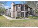 Building exterior with walkway and landscaping at 3958 Dream Oak Pl # 104, Tampa, FL 33613