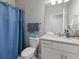 Clean bathroom with a shower/tub combo and granite countertop at 5211 Marina Basin Ct, Bradenton, FL 34211
