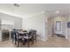 Dining room features a built-in wine cooler and entryway view at 5211 Marina Basin Ct, Bradenton, FL 34211