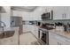 Modern kitchen with stainless steel appliances and granite countertops at 5211 Marina Basin Ct, Bradenton, FL 34211