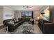 Relaxing living room with sectional sofa, large TV, and backyard view at 5211 Marina Basin Ct, Bradenton, FL 34211
