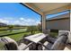 Relaxing screened patio overlooking a pond and community at 5211 Marina Basin Ct, Bradenton, FL 34211