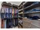 Large walk-in closet with ample shelving and hanging space at 5211 Marina Basin Ct, Bradenton, FL 34211