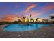 Community water park with colorful play features at sunset at 5211 Marina Basin Ct, Bradenton, FL 34211
