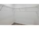 Large walk-in closet with wire shelving at 6211 Golden Beach Dr, Apollo Beach, FL 33572