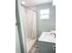 Updated bathroom with a walk-in shower and modern vanity at 690 Fox St, Longboat Key, FL 34228