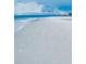 Scenic beach view with footprints in the sand at 690 Fox St, Longboat Key, FL 34228