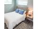 Comfortable bedroom with a queen-size bed and soft color scheme at 690 Fox St, Longboat Key, FL 34228