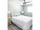 Spacious bedroom with a queen-size bed and calming decor at 690 Fox St, Longboat Key, FL 34228