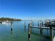 Calm marina with boats and clear water at 690 Fox St, Longboat Key, FL 34228