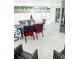 Relaxing patio area with seating for dining and grilling at 690 Fox St, Longboat Key, FL 34228