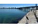 Stunning waterfront view with bridge and heron at 690 Fox St, Longboat Key, FL 34228