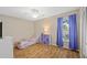 Charming bedroom with wood floors and window at 7007 Westminster St, Tampa, FL 33635