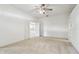 Spacious bedroom with plush carpeting and ample closet space at 8529 Alexandra Arbor Ln, Temple Terrace, FL 33637