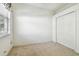 Well-lit bedroom with double door closet and ceiling fan at 8529 Alexandra Arbor Ln, Temple Terrace, FL 33637