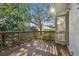 Deck with access from interior and a view of the backyard at 8529 Alexandra Arbor Ln, Temple Terrace, FL 33637