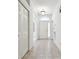 Clean and airy entryway with tile floors and ample closet space at 8529 Alexandra Arbor Ln, Temple Terrace, FL 33637