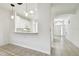 Spacious entryway with tile flooring and views into the kitchen and living areas at 8529 Alexandra Arbor Ln, Temple Terrace, FL 33637