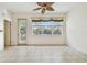 Living room with patio access and a view of the backyard at 8529 Alexandra Arbor Ln, Temple Terrace, FL 33637