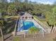 Inviting community pool with surrounding landscape and fenced area at 8529 Alexandra Arbor Ln, Temple Terrace, FL 33637