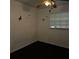 Simple bedroom with dark flooring and window blinds at 901 8Th Sw St, Ruskin, FL 33570