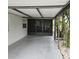 Covered carport with screened enclosure at 901 8Th Sw St, Ruskin, FL 33570