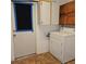 Laundry room with washer, dryer, and cabinets at 901 8Th Sw St, Ruskin, FL 33570