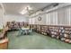 Well-lit library with a seating area and a wide selection of books at 4140 55Th N St # 1211, Kenneth City, FL 33709