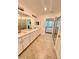 Double vanity bathroom with a large shower at 10059 Crooked Creek Dr # 102, Venice, FL 34293