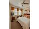 Bedroom with a queen bed and calming decor at 10059 Crooked Creek Dr # 102, Venice, FL 34293