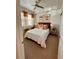 Bedroom with a queen bed and calming decor at 10059 Crooked Creek Dr # 102, Venice, FL 34293